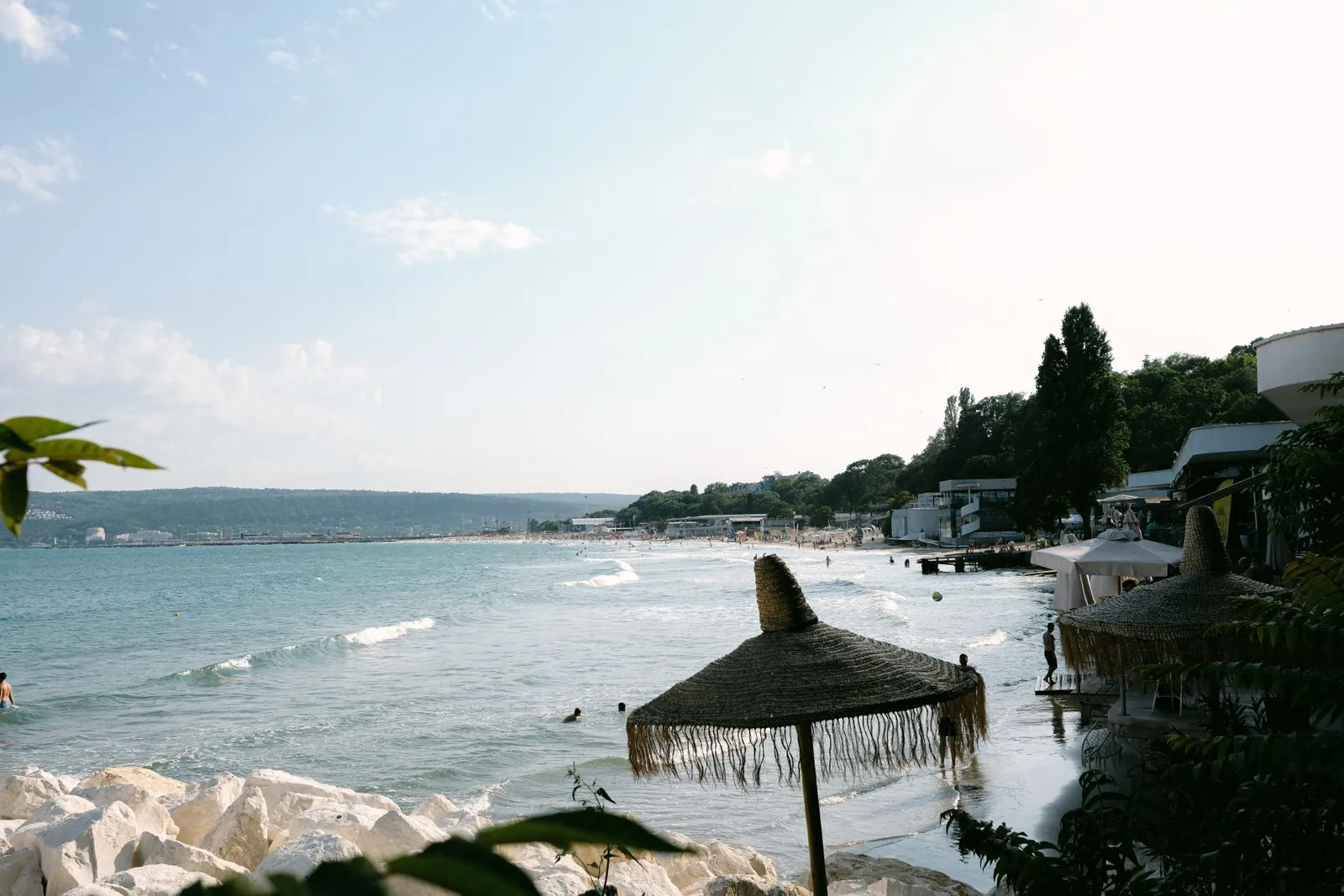 Beach with umbrellas and clear water on the Bulgarian Black Sea coast. Photo by Ramon Karolan.