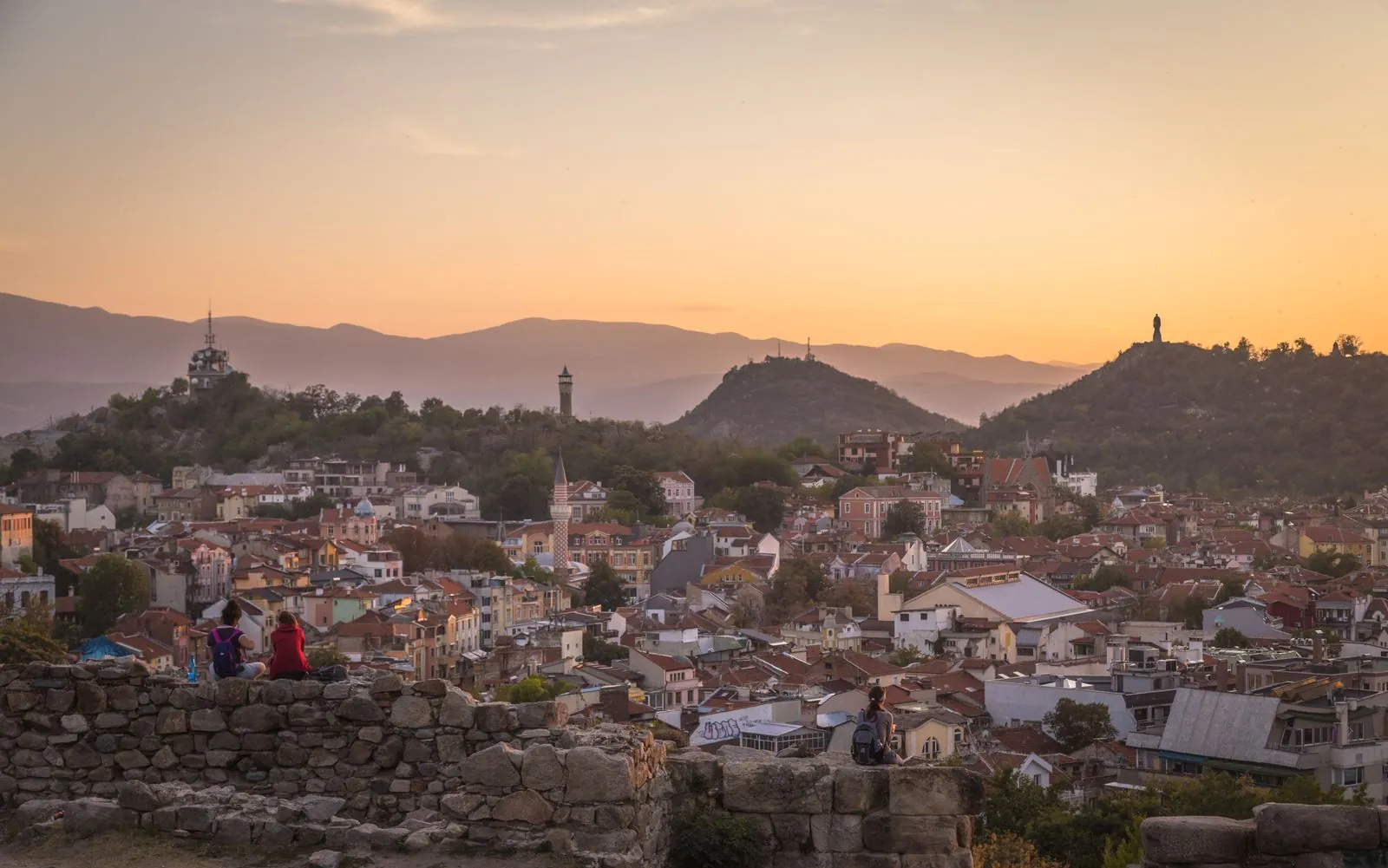 Panorama of Plovdiv at sunset with mountains in the distance. Photo by Anton Atanasov.